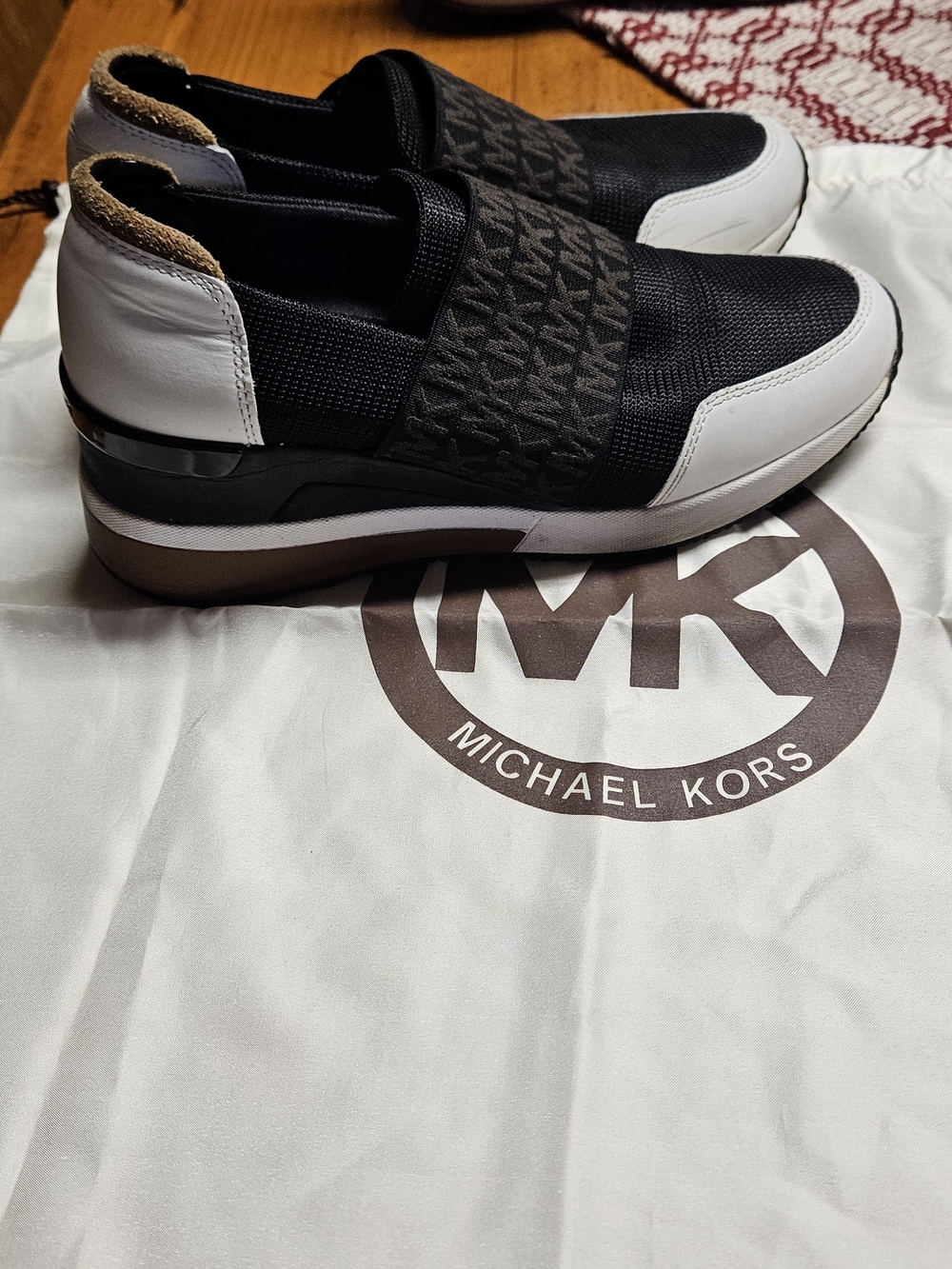 Michael Kors Womens Black and White Slip-On Sneaker
